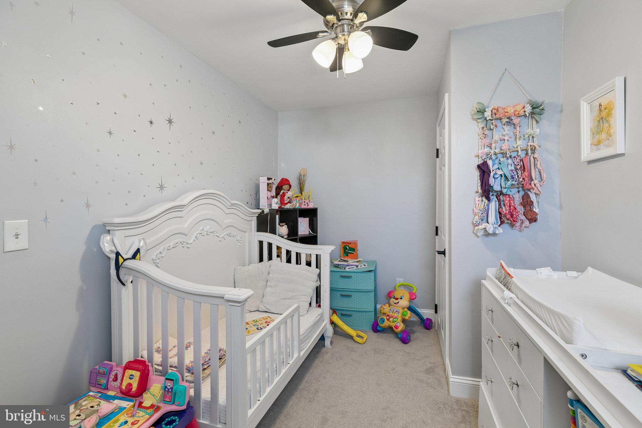 5365 Morris Street Philadelphia, PA 19144 - Photo 25 of 35 a bedroom with a bed and wooden floor