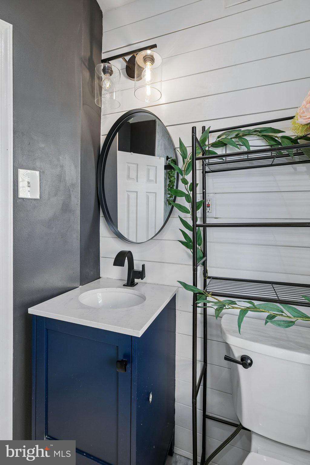 5365 Morris Street Philadelphia, PA 19144 - Photo 27 of 35 a bathroom with a sink and mirror