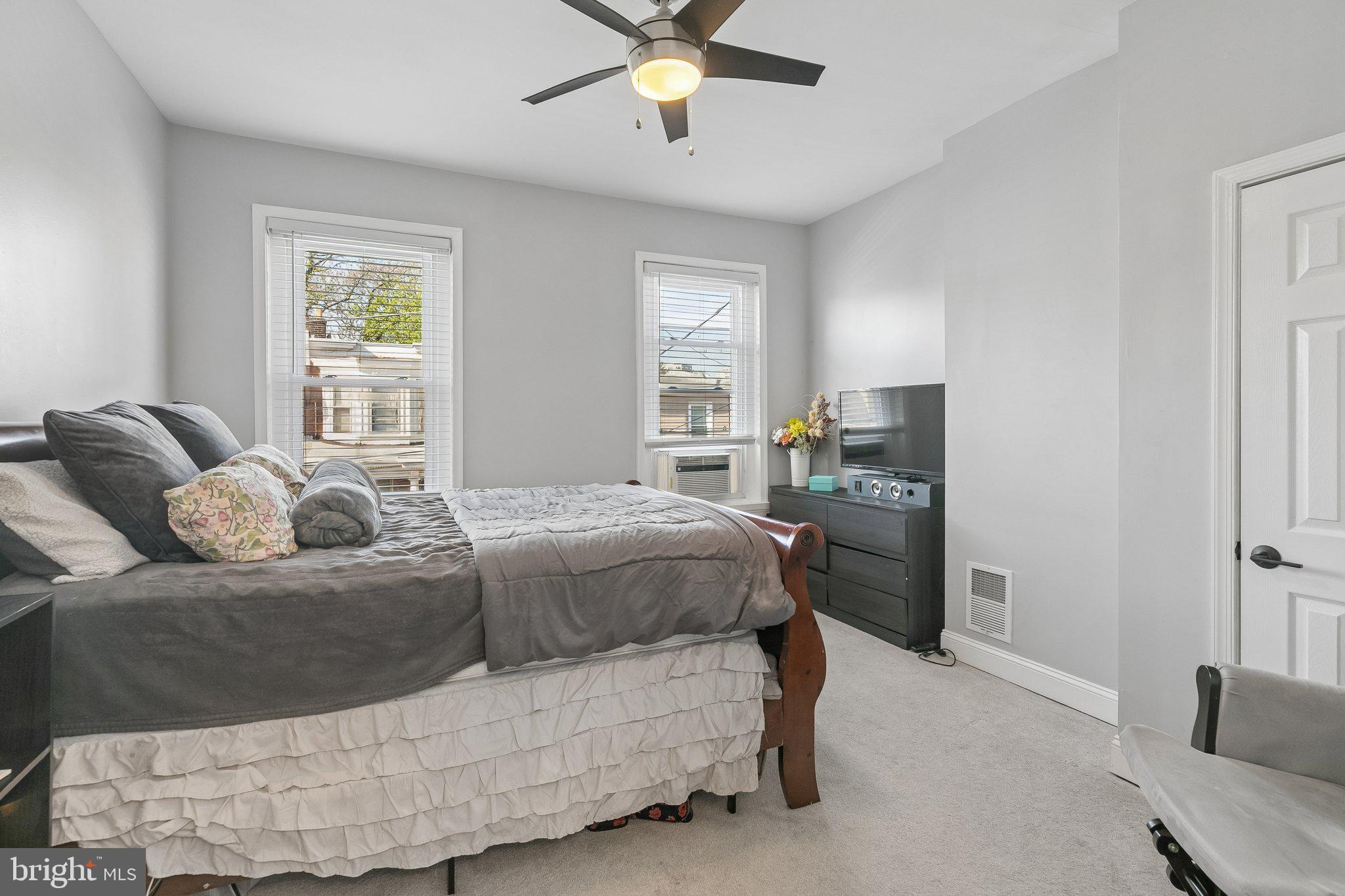 5365 Morris Street Philadelphia, PA 19144 - Photo 30 of 35 a bedroom with a bed and window