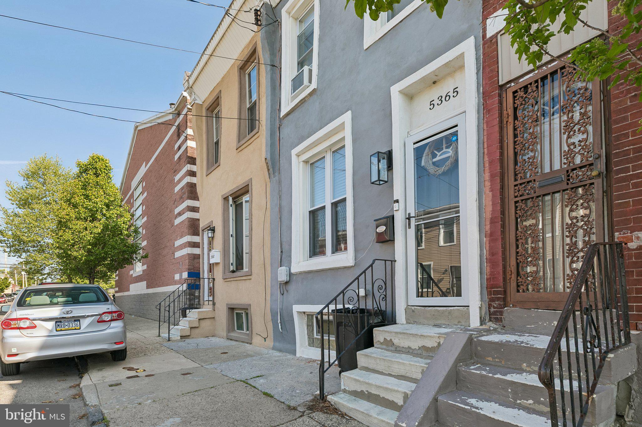 5365 Morris Street Philadelphia, PA 19144 - Photo 5 of 35 a view of a building and car parked on the road