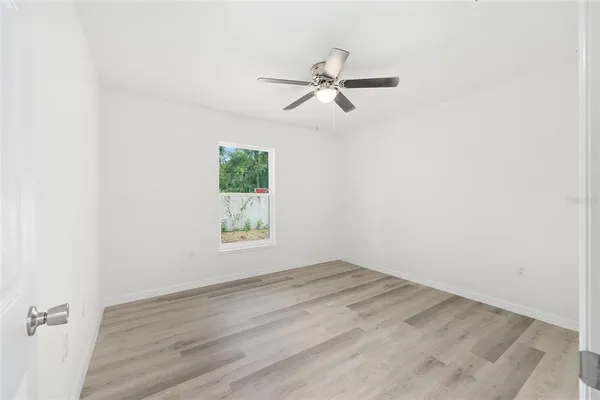 a view of a room that has a window in it