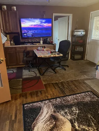 a view of a workspace with furniture