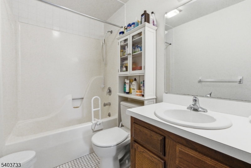 210 Highway 284 Wantage, NJ 07461 - Photo 18 of 28 a bathroom with a sink toilet and shower
