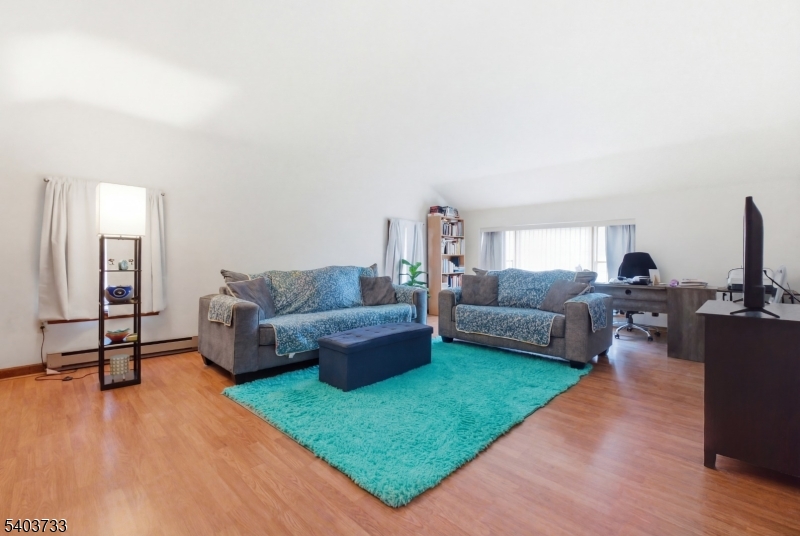 210 Highway 284 Wantage, NJ 07461 - Photo 19 of 28 a living room with furniture and a wooden floor