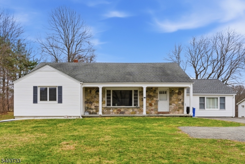 210 Highway 284 Wantage, NJ 07461 - Photo 2 of 28 a front view of a house with a garden