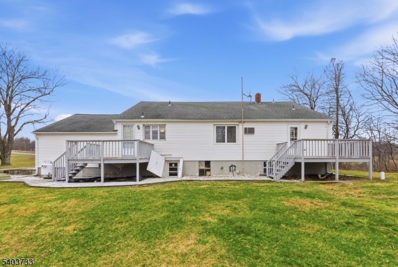 210 Highway 284 Wantage, NJ 07461 - Photo 22 of 28 front view of a house with a yard