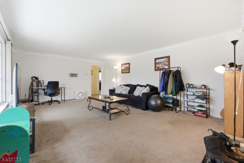 210 Highway 284 Wantage, NJ 07461 - Photo 5 of 28 a living room with furniture and a flat screen tv