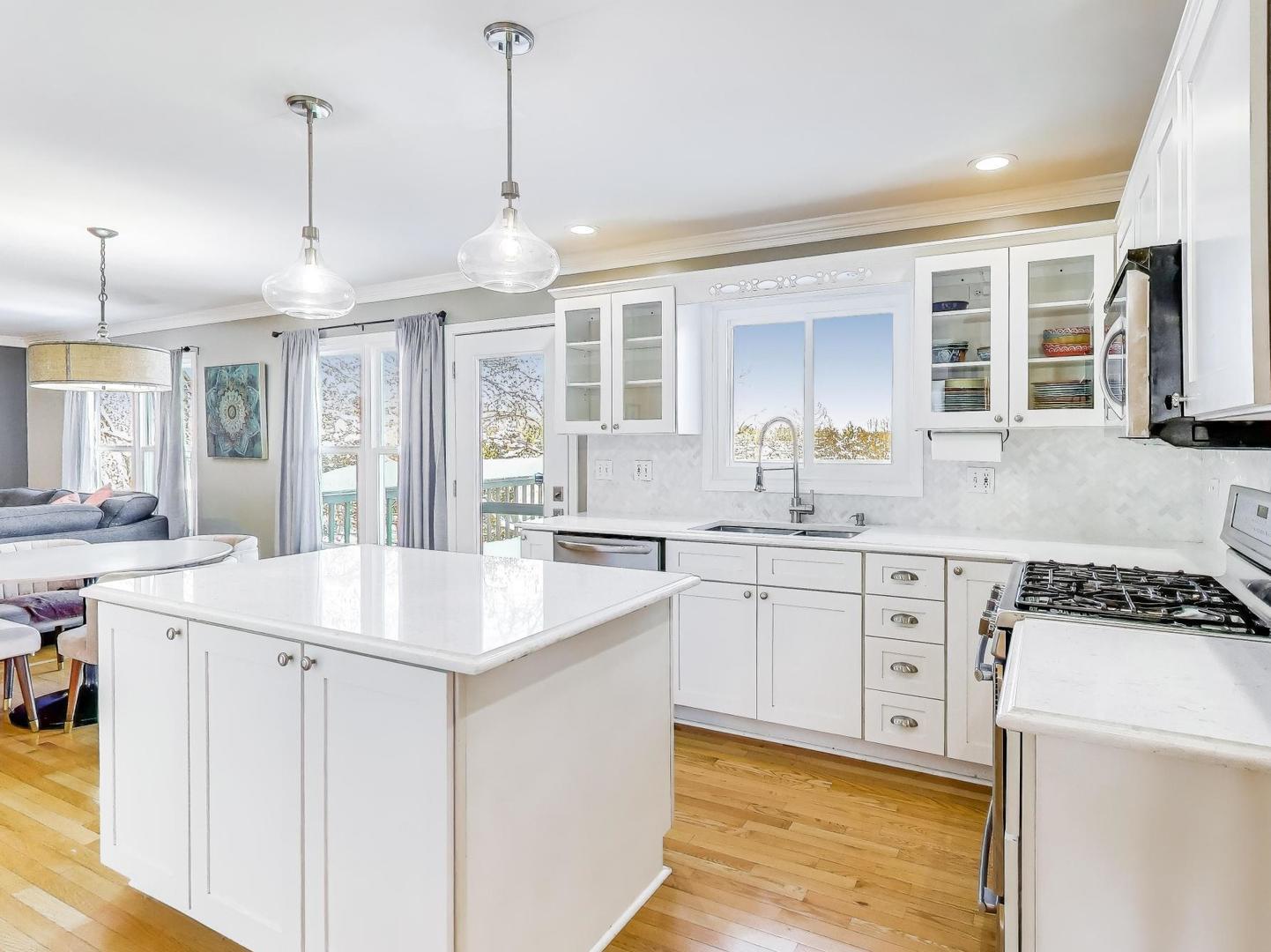 660 Robin Ridge Elgin, IL 60123 - Photo 11 of 29 a kitchen with a sink stove and cabinets