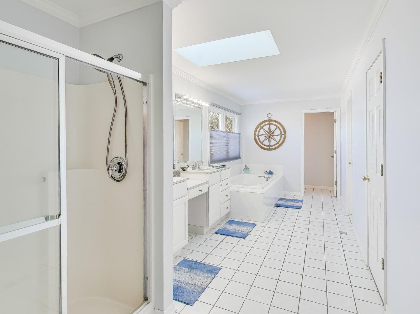 660 Robin Ridge Elgin, IL 60123 - Photo 17 of 29 a bathroom with a granite countertop sink a toilet and a shower