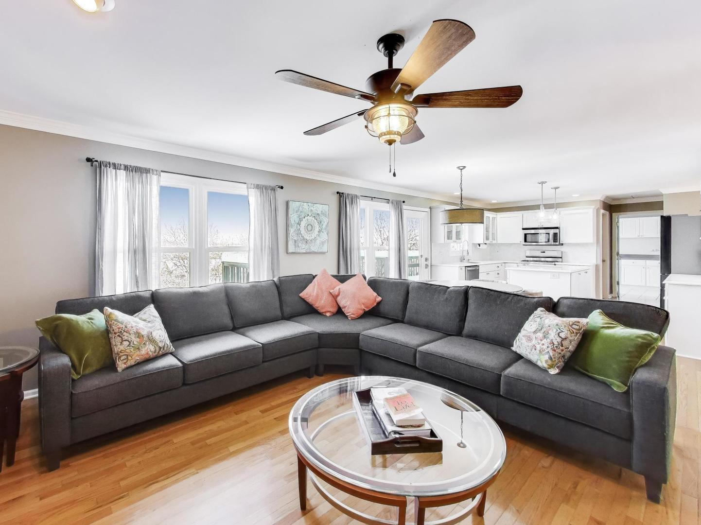 660 Robin Ridge Elgin, IL 60123 - Photo 8 of 29 a living room with furniture and a large window