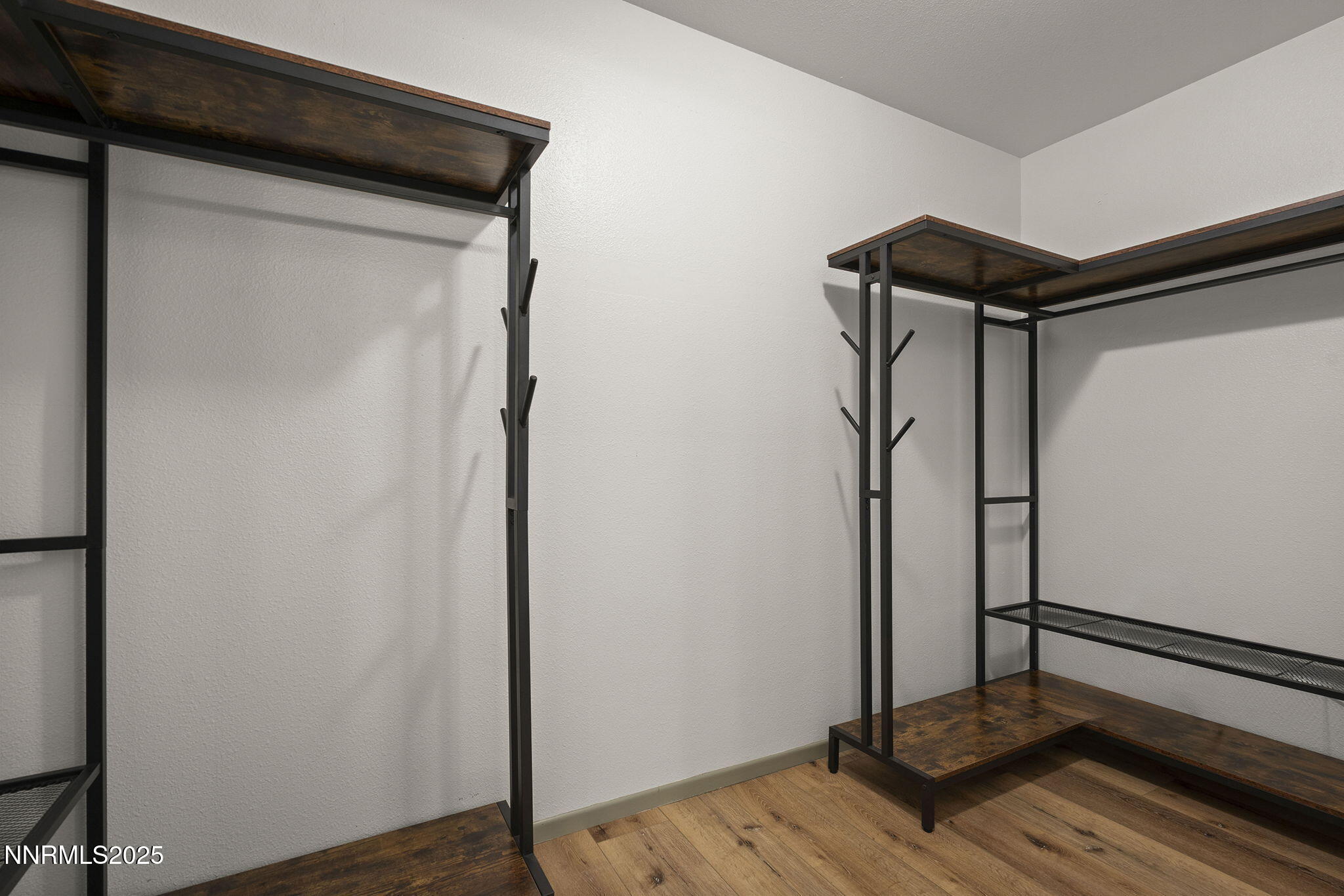 7690 Deep Bay Drive Reno, NV 89506 - Photo 17 of 26 a view of a room with wooden floor