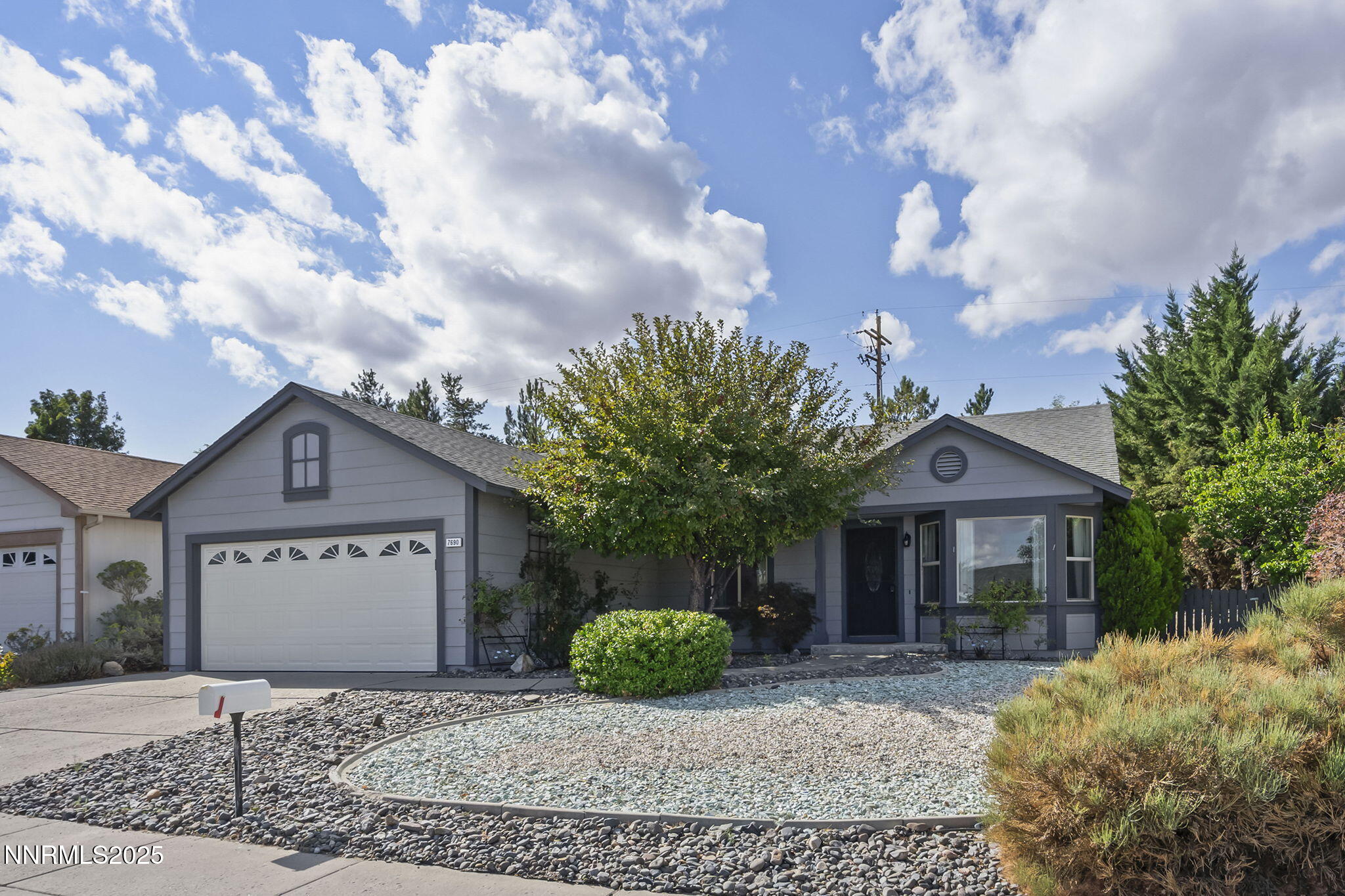 7690 Deep Bay Drive Reno, NV 89506 - Photo 26 of 26 a front view of a house with garden