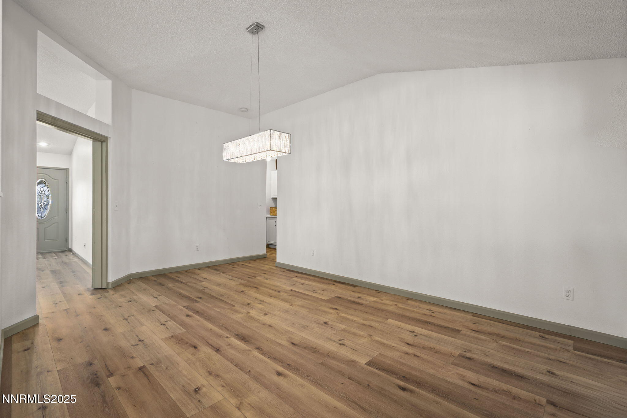 7690 Deep Bay Drive Reno, NV 89506 - Photo 10 of 26 a view of an empty room and chandelier fan