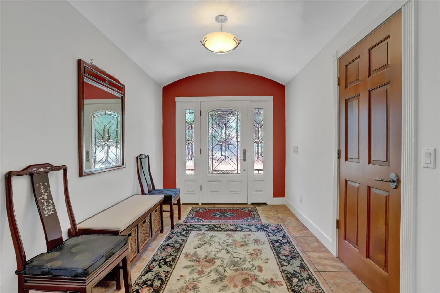 10978 Squirrel Creek Road Grass Valley, CA 95945 - Photo 3 of 73 a view of an entryway with a rug