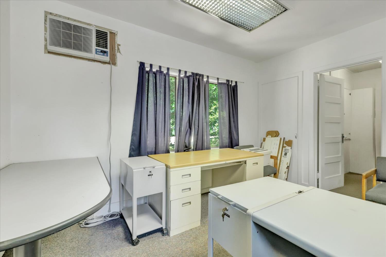 10978 Squirrel Creek Road Grass Valley, CA 95945 - Photo 54 of 73 a room with a bed and a table in it