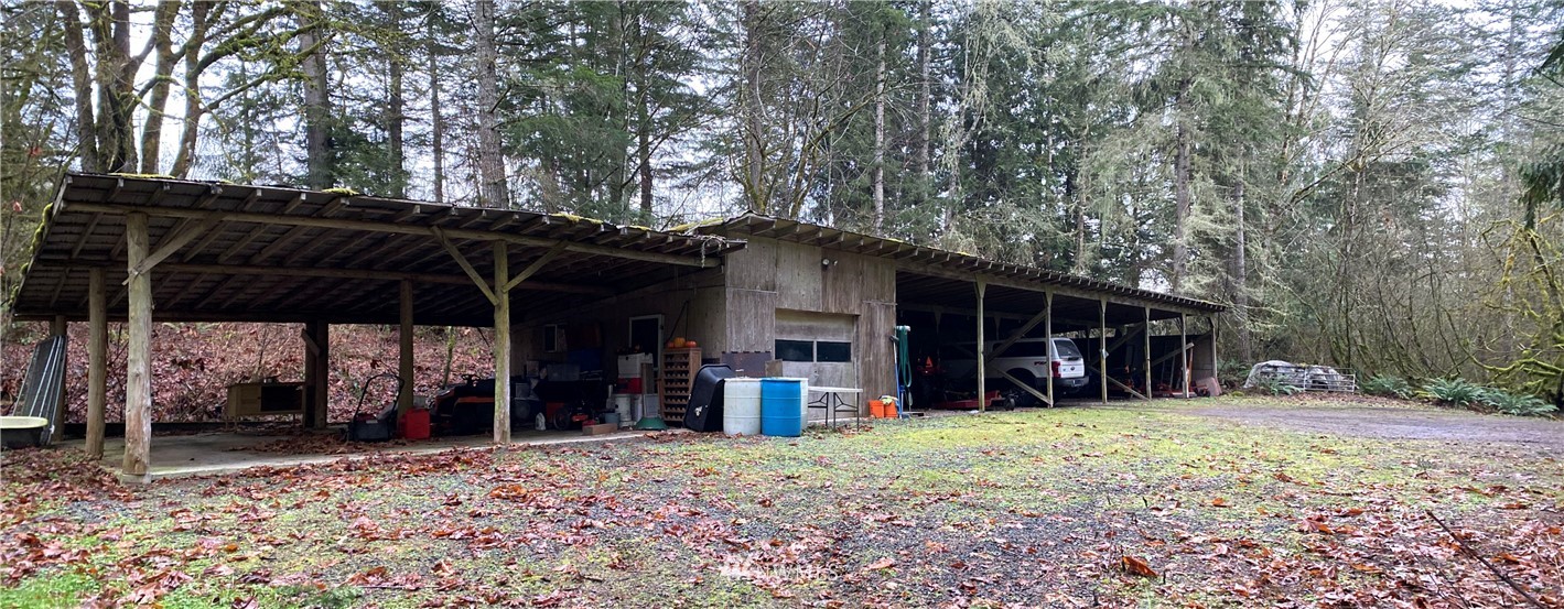 991 Lords Lake Loop Road Quilcene, WA 98376 - Photo 20 of 34 a view of a car park in front of a house