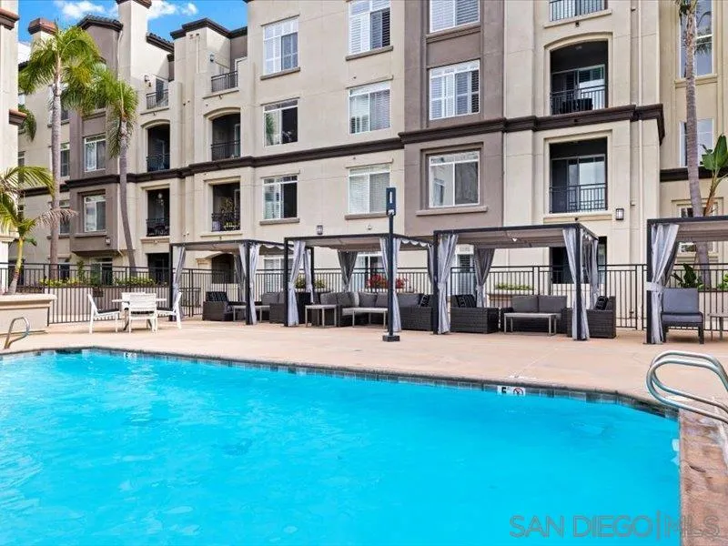 9237 Regents Road, Unit K101 La Jolla, CA 92037 - Photo 18 of 29 a view of an apartment with a swimming pool