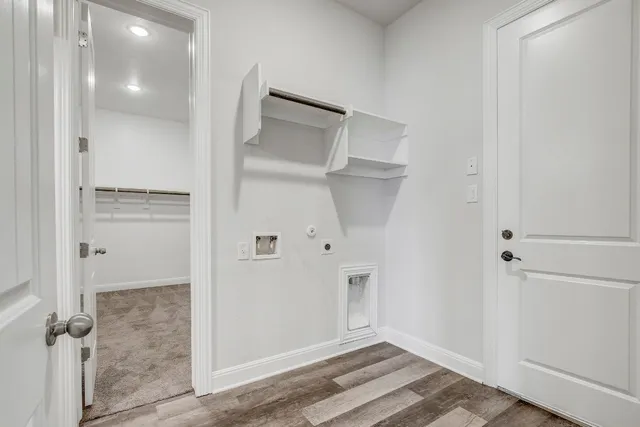 a view of a hallway with closet