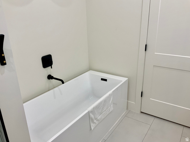 277 West 800 South Monroe, UT 84754 - Photo 18 of 46 Full bathroom with light tile patterned flooring and a soaking tub