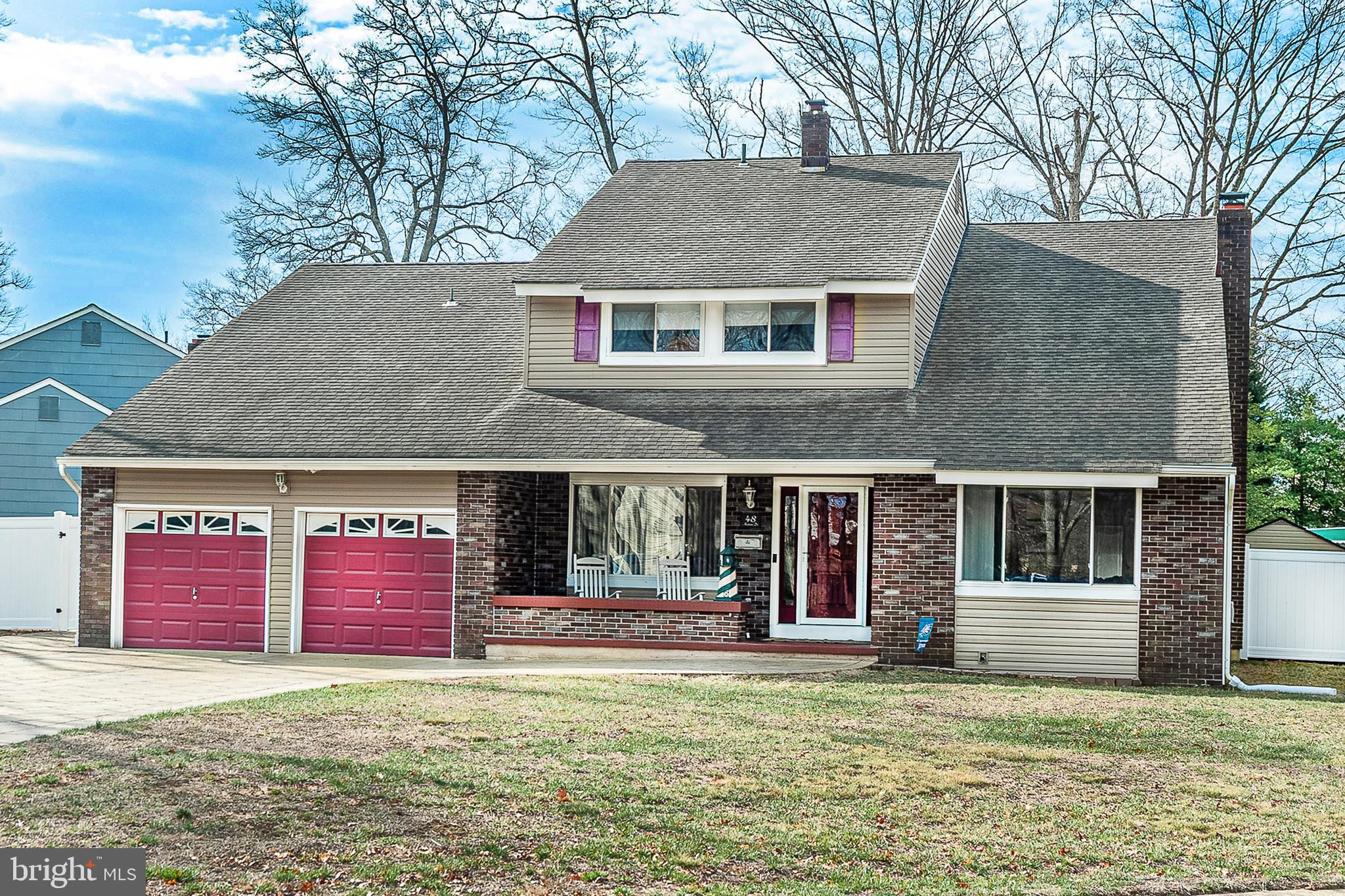 48 Aristone Drive Berlin, NJ 08009 - Photo 1 of 34 a house with red door