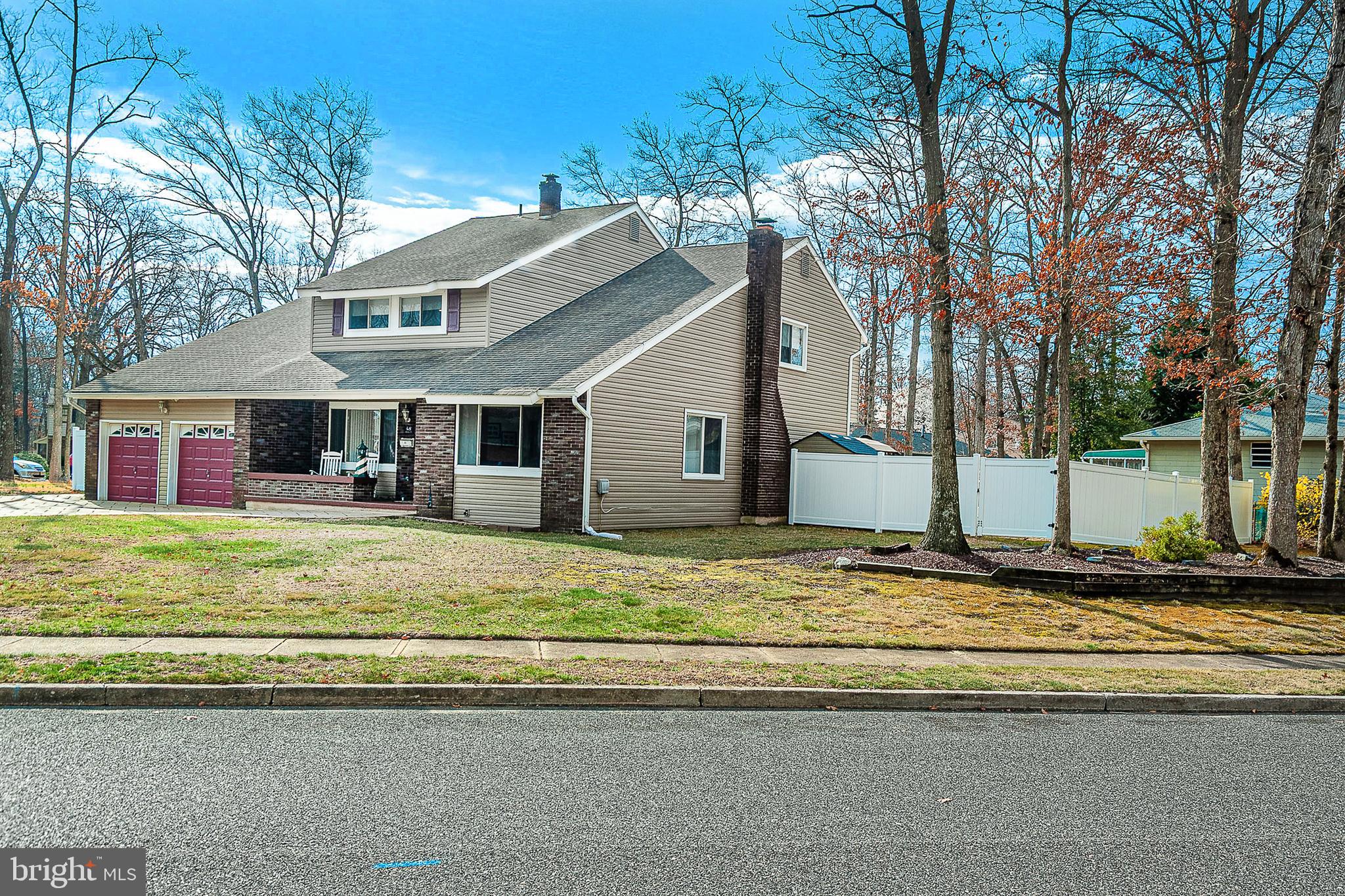 48 Aristone Drive Berlin, NJ 08009 - Photo 3 of 34 a view of a house with a patio and a yard