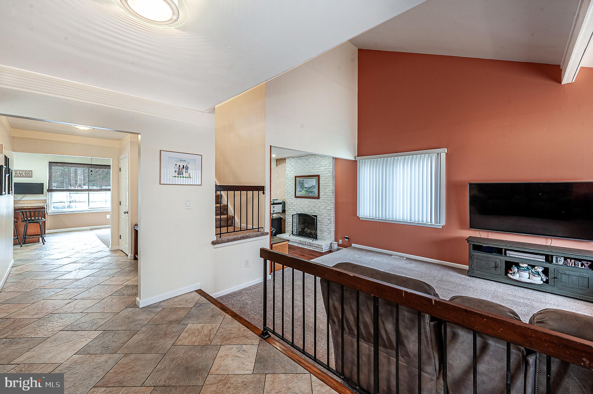 48 Aristone Drive Berlin, NJ 08009 - Photo 5 of 34 a view of a livingroom with furniture and flat screen tv