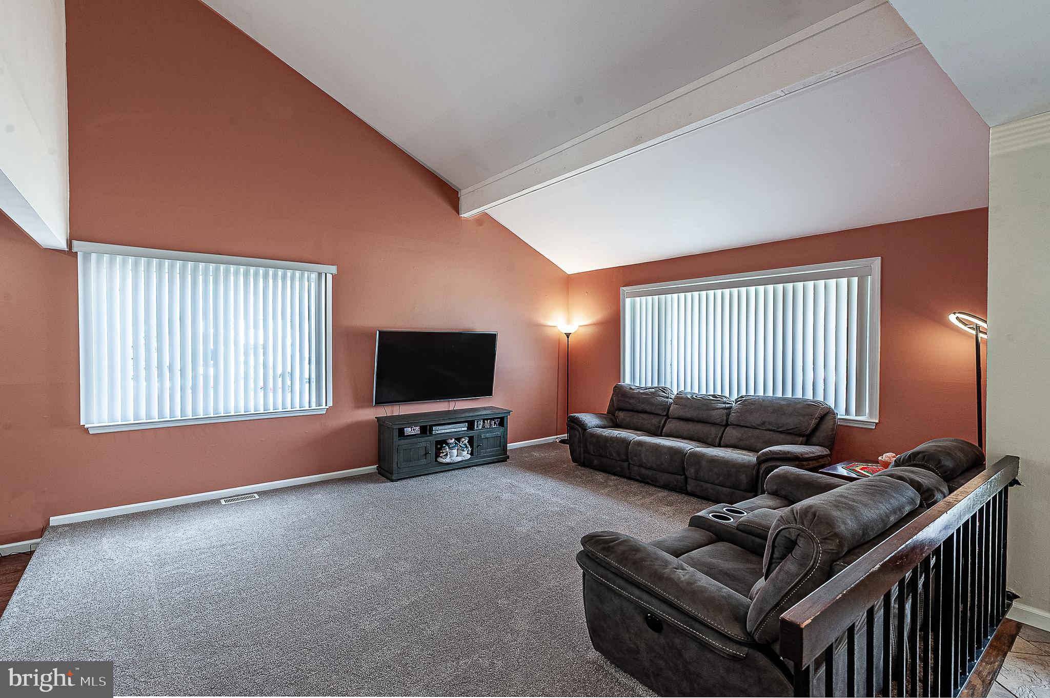 48 Aristone Drive Berlin, NJ 08009 - Photo 6 of 34 a living room with furniture and a flat screen tv