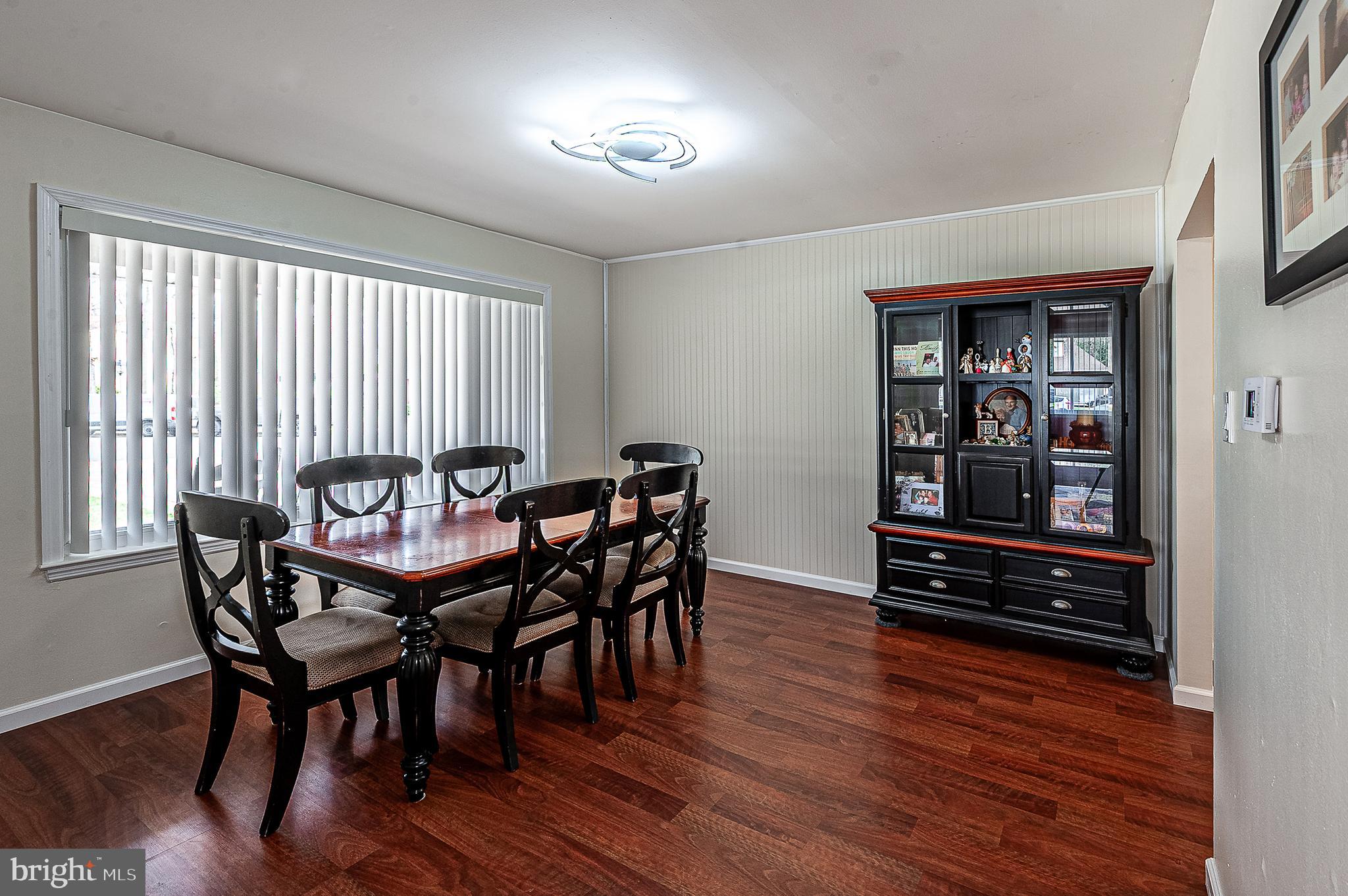 48 Aristone Drive Berlin, NJ 08009 - Photo 8 of 34 a view of a dining room with furniture and wooden floor