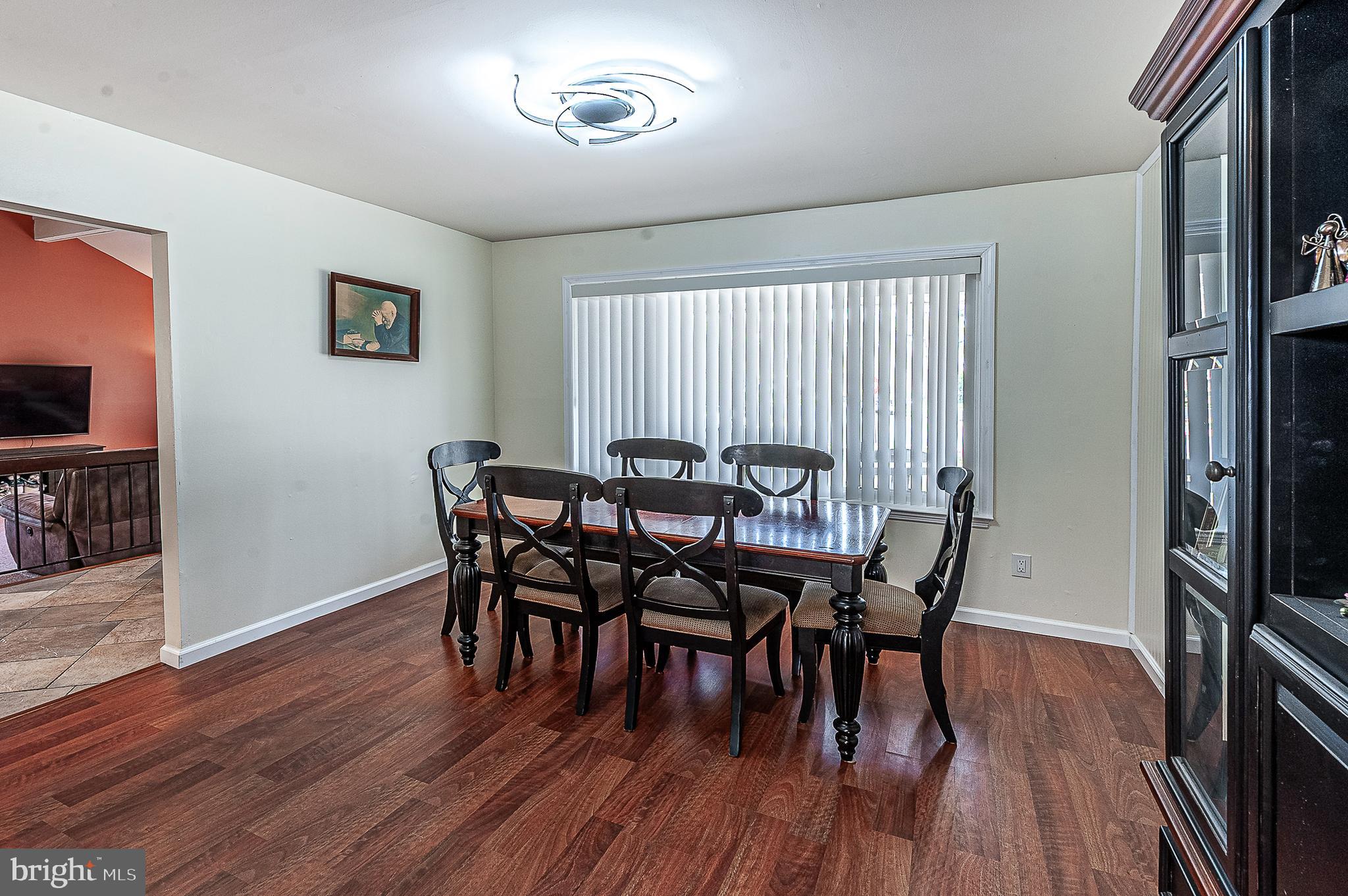 48 Aristone Drive Berlin, NJ 08009 - Photo 9 of 34 a view of a dining room with furniture and wooden floor