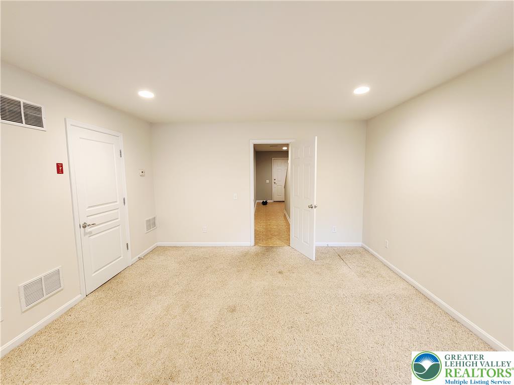 8513 Gateway Road Breinigsville, PA 18031 - Photo 9 of 45 Well-lit and carpeted, this versatile room awaits your personal touch.