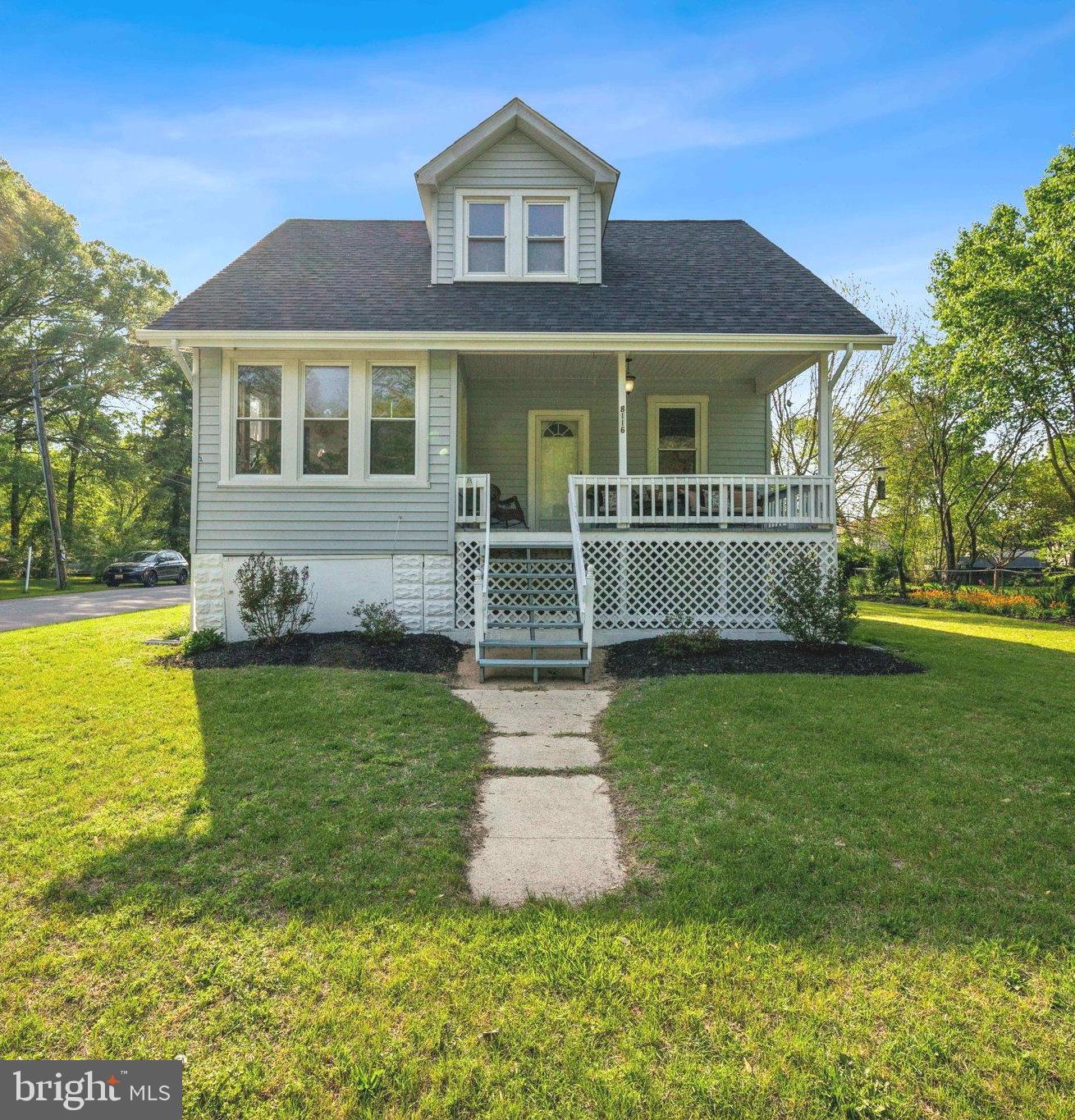 8116 Beverly Road Severn, MD 21144 - Photo 1 of 24 a front view of a house with garden