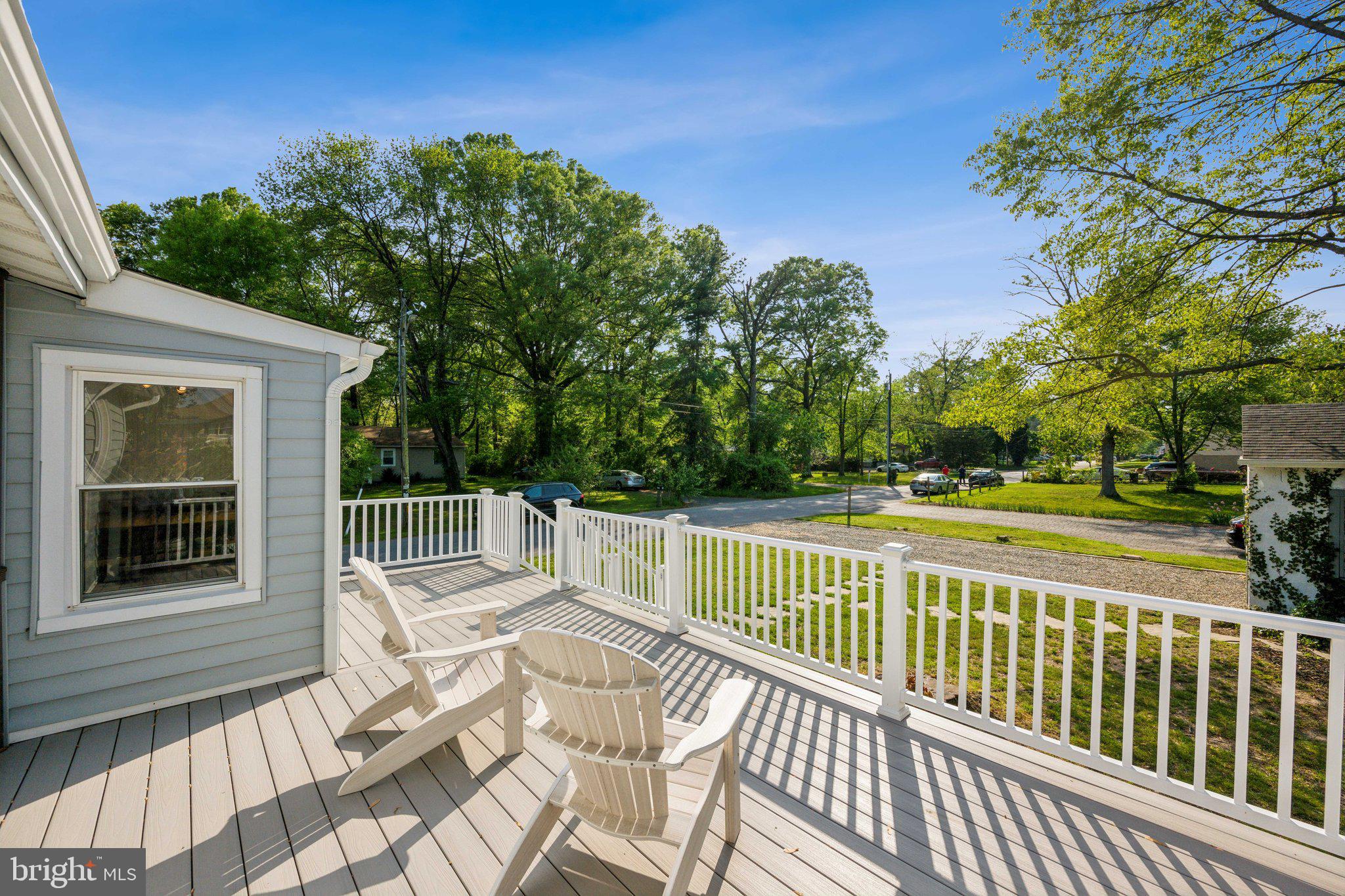 8116 Beverly Road Severn, MD 21144 - Photo 21 of 24 a view of balcony with wooden floor and outdoor seating