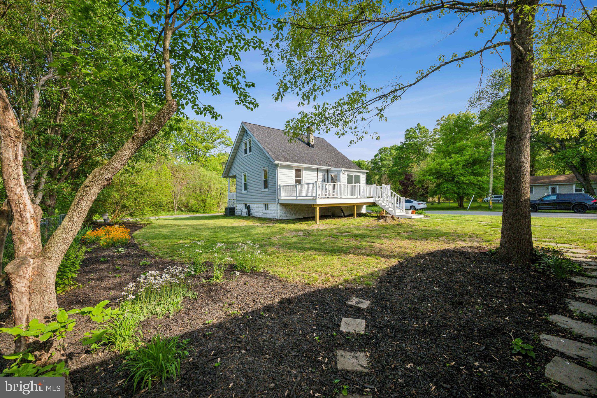 8116 Beverly Road Severn, MD 21144 - Photo 23 of 24 a front view of a house with a yard