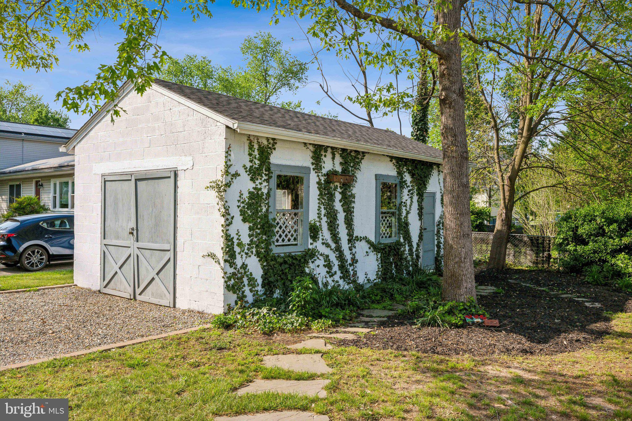 8116 Beverly Road Severn, MD 21144 - Photo 24 of 24 a front view of a house with garden