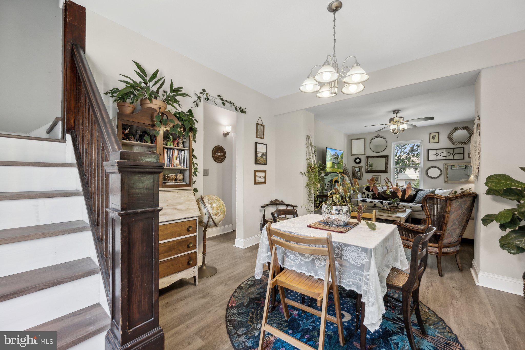 8116 Beverly Road Severn, MD 21144 - Photo 5 of 24 a view of a dining room with furniture and wooden floor