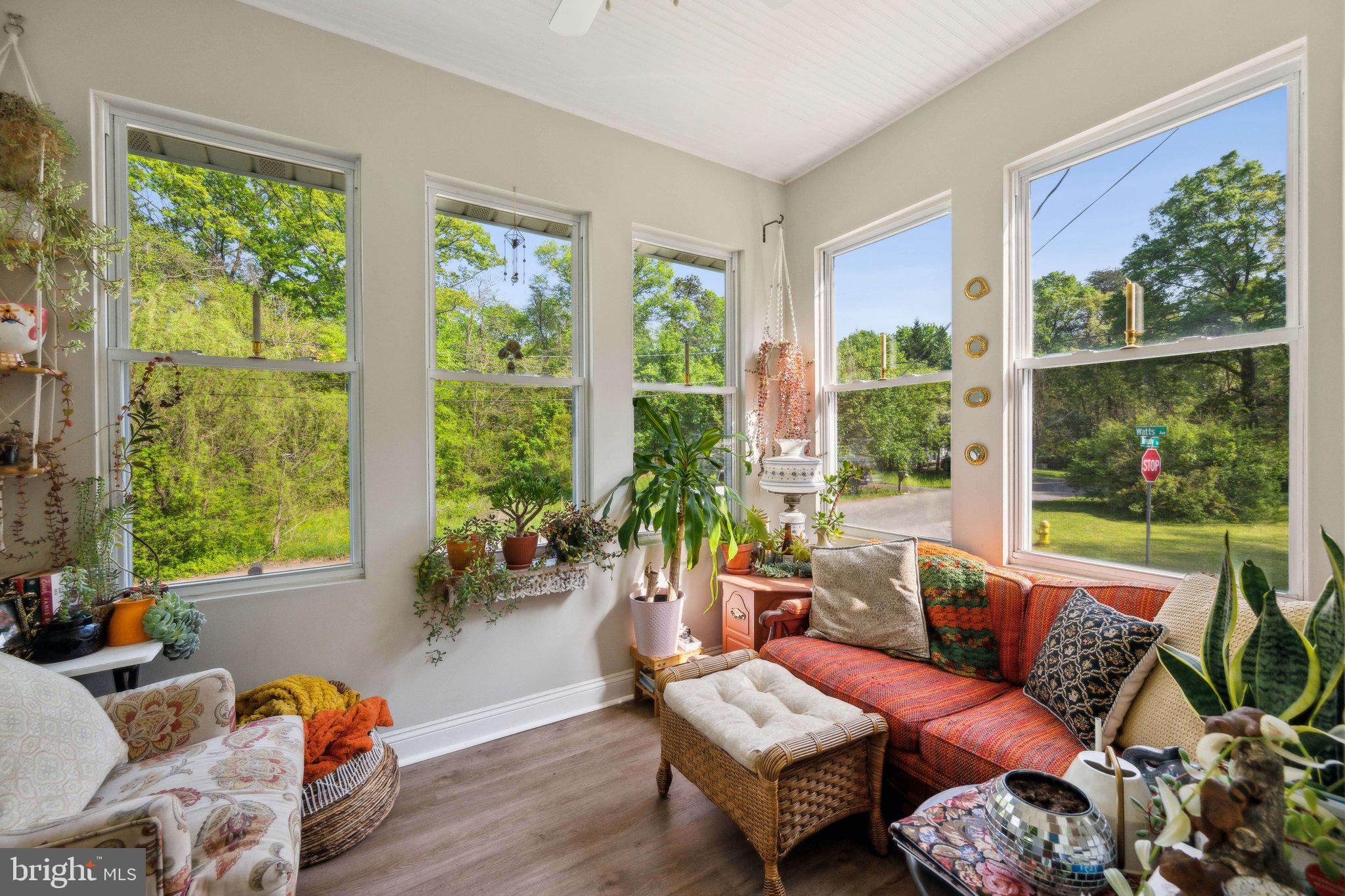 8116 Beverly Road Severn, MD 21144 - Photo 9 of 24 a living room with furniture and floor to ceiling windows