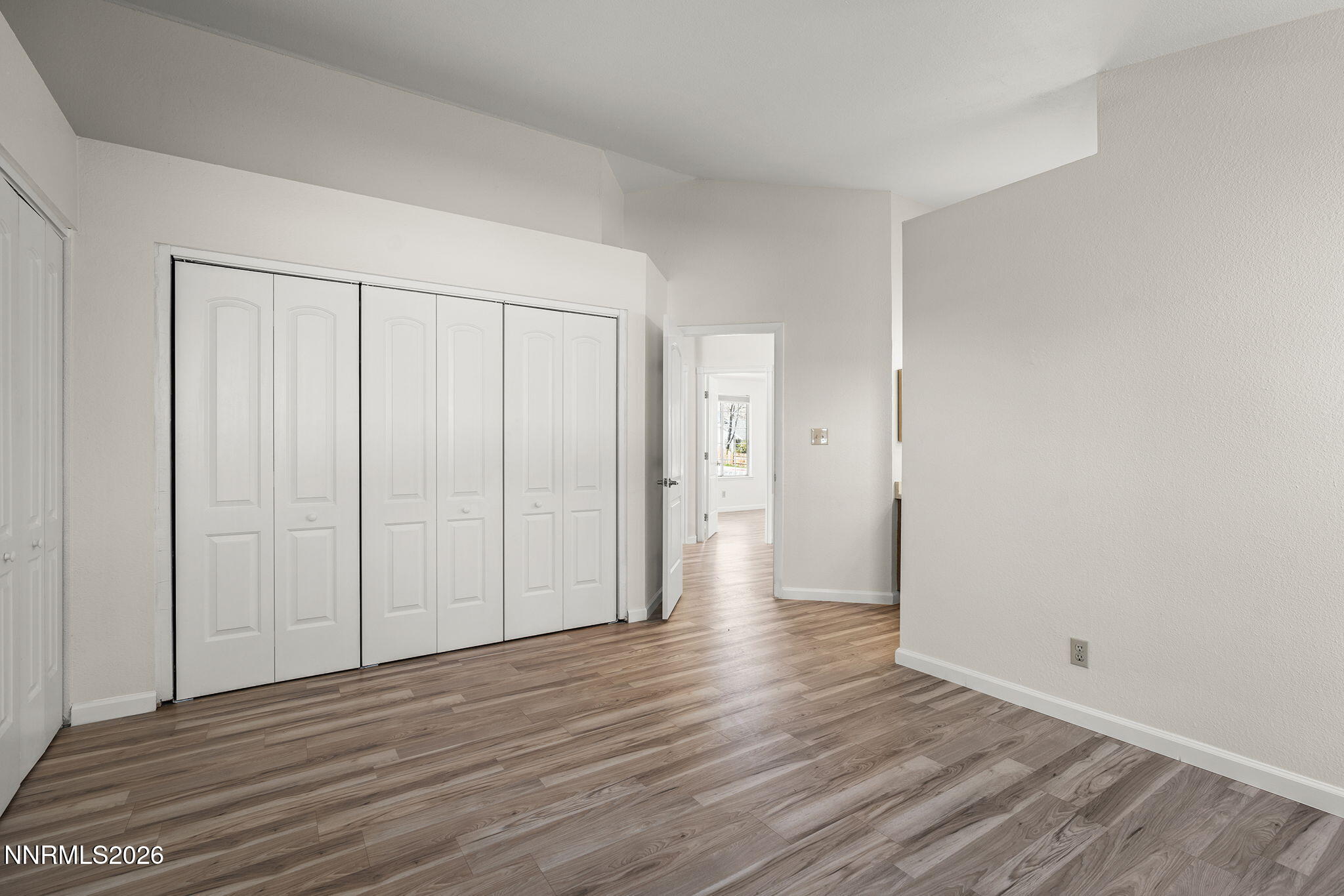 6290 Chesterfield Lane Reno, NV 89523 - Photo 14 of 21 a view of wooden floor and windows in a room