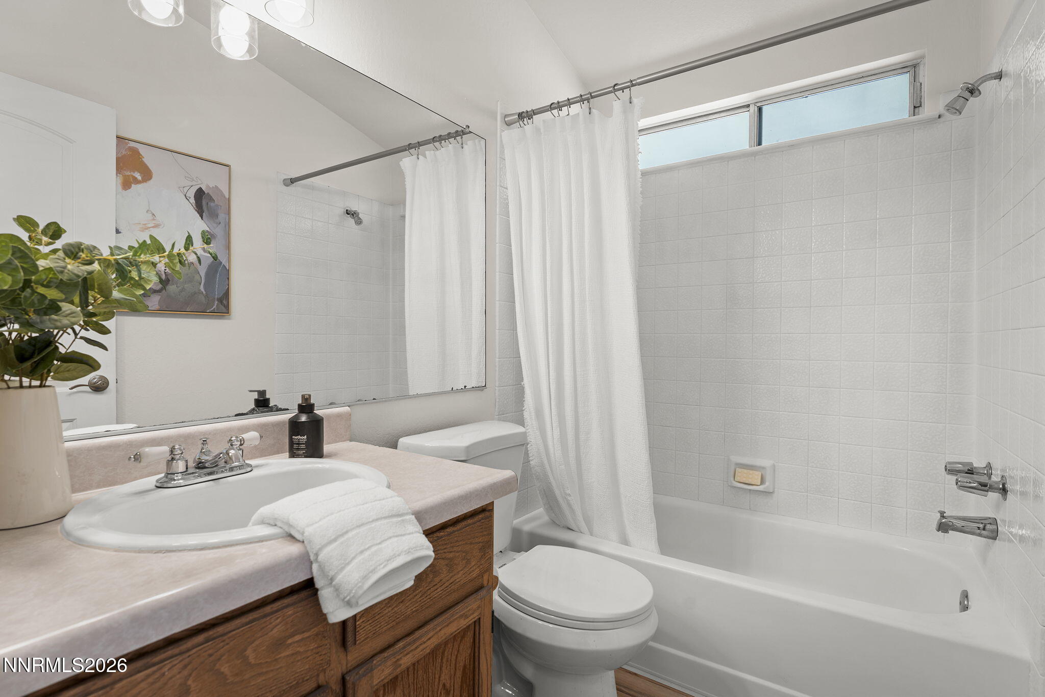 6290 Chesterfield Lane Reno, NV 89523 - Photo 16 of 21 a bathroom with a sink toilet and shower