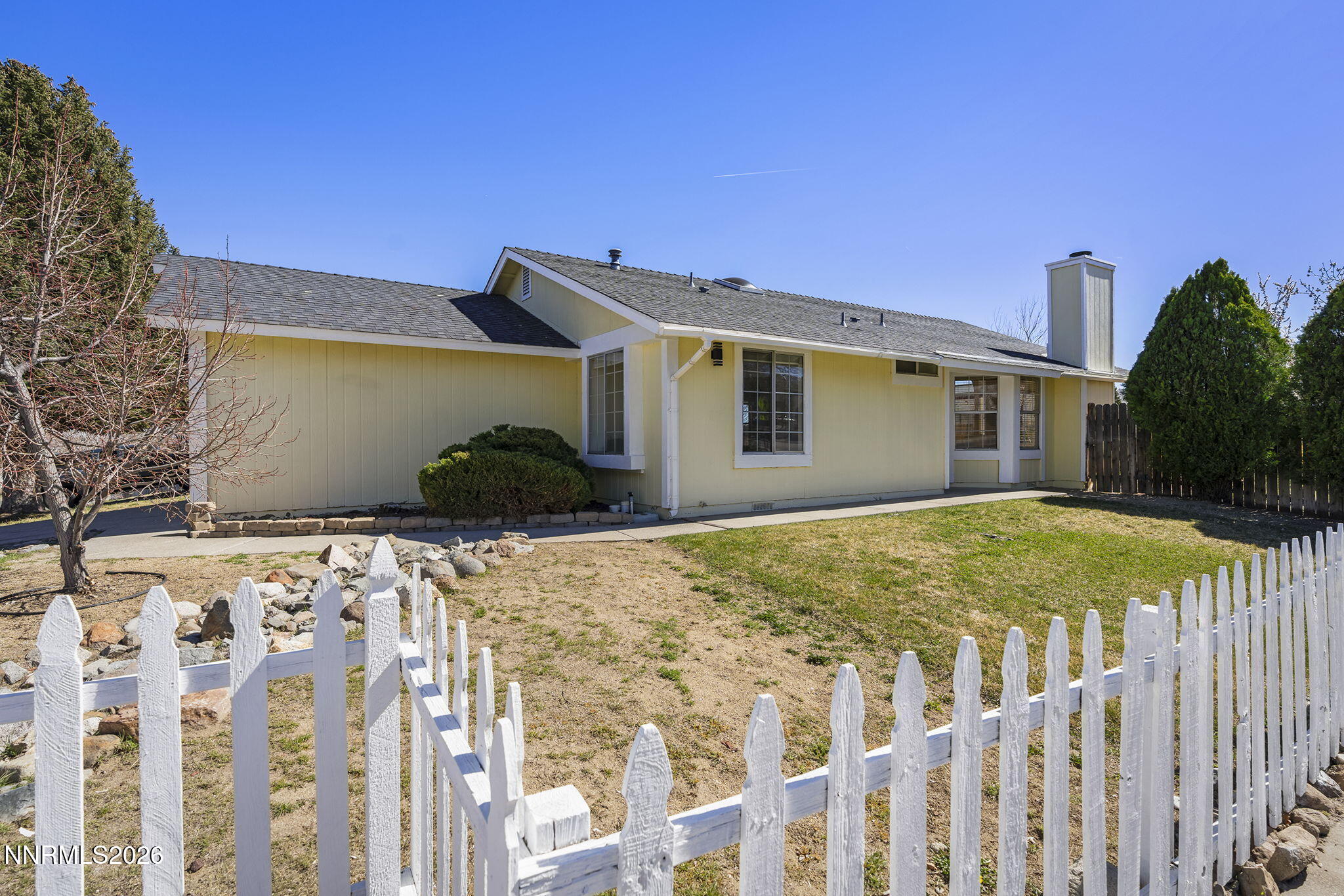 6290 Chesterfield Lane Reno, NV 89523 - Photo 2 of 21 a bathroom with a sink and mirror