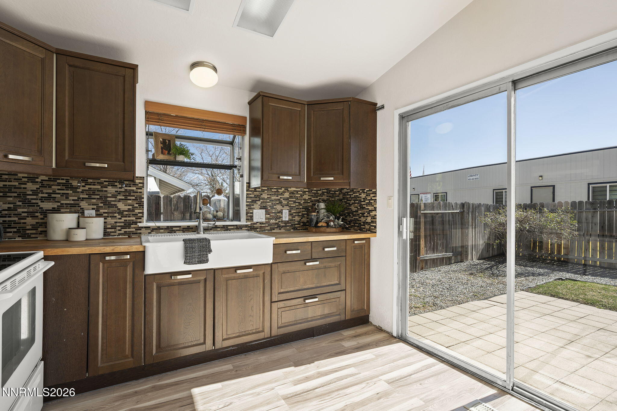6290 Chesterfield Lane Reno, NV 89523 - Photo 3 of 21 a kitchen with stainless steel appliances granite countertop a stove a sink and a cabinets