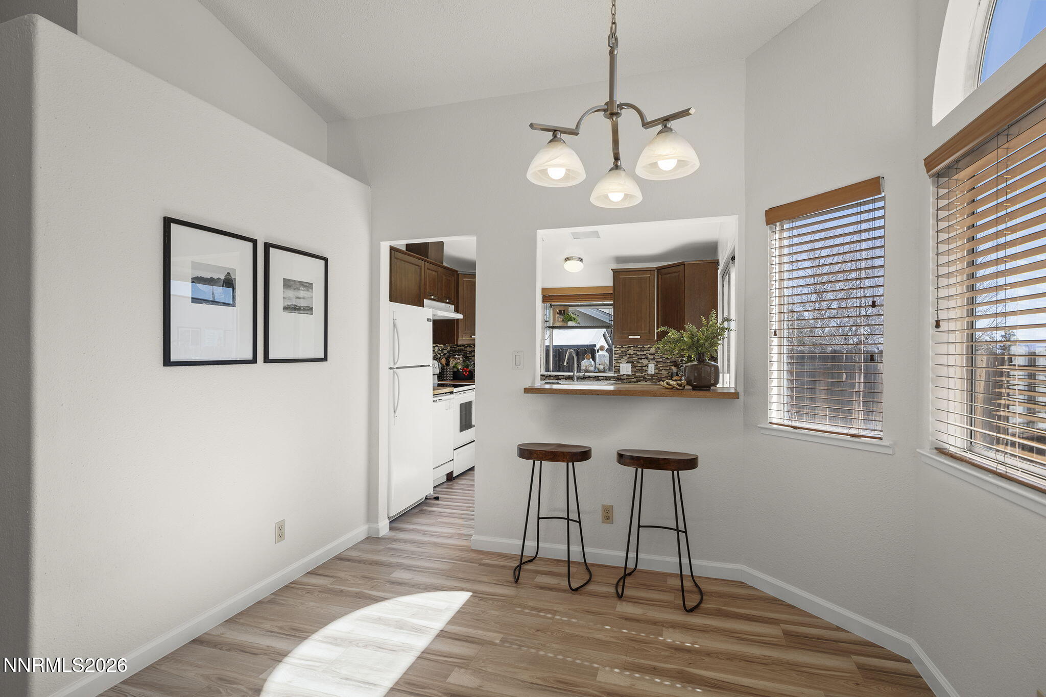 6290 Chesterfield Lane Reno, NV 89523 - Photo 6 of 21 a view of a livingroom with furniture window and wooden floor