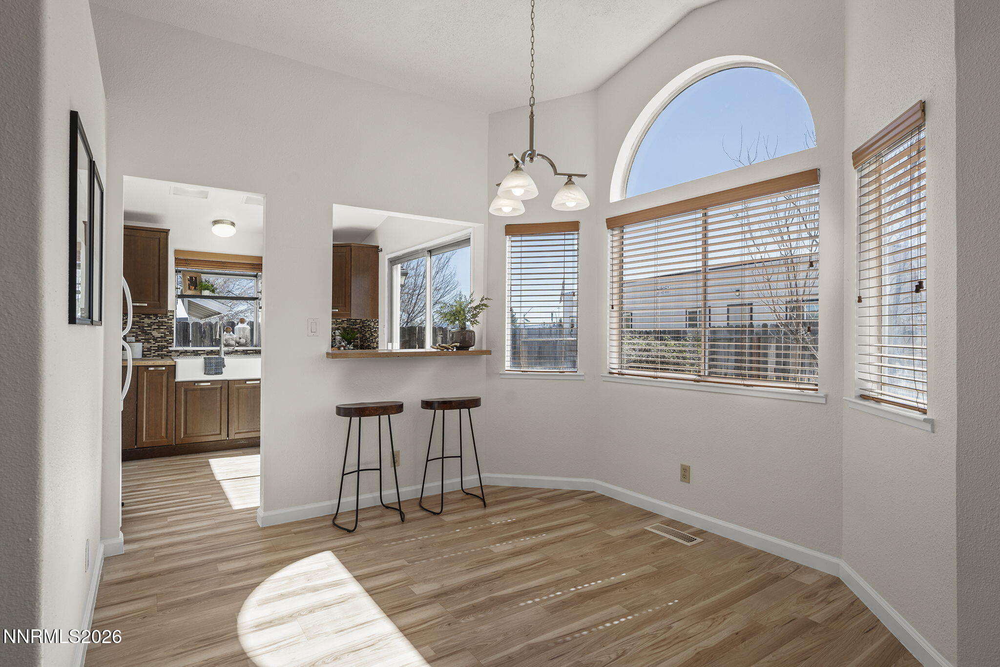 6290 Chesterfield Lane Reno, NV 89523 - Photo 7 of 21 a view of a livingroom with furniture window and wooden floor