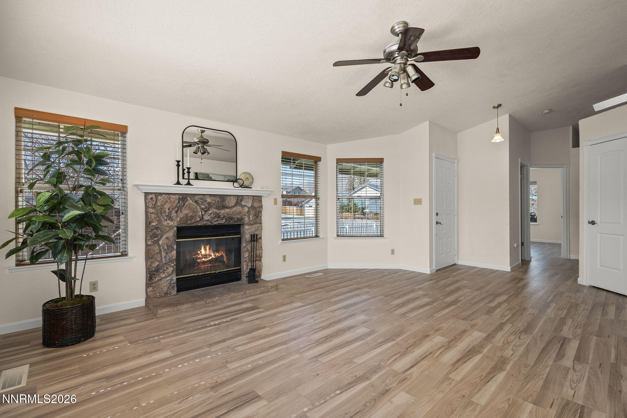 6290 Chesterfield Lane Reno, NV 89523 - Photo 10 of 21 a living room with furniture and a fireplace
