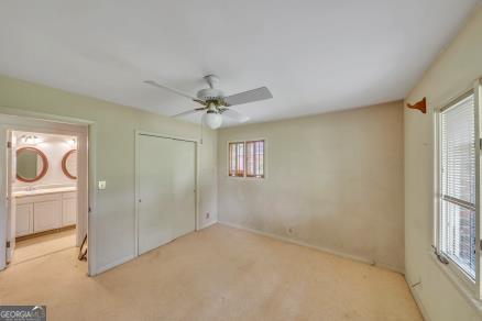 111 Roberson Street Dublin, GA 31021 - Photo 11 of 15 a view of an empty room and window