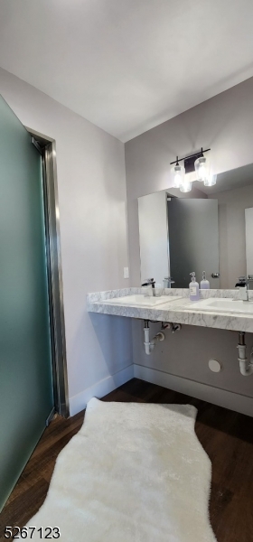 58 Elm Street, Unit 601 Newark, NJ 07105 - Photo 12 of 15 a bathroom with a sink and a mirror