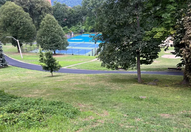 a view of a building on a street