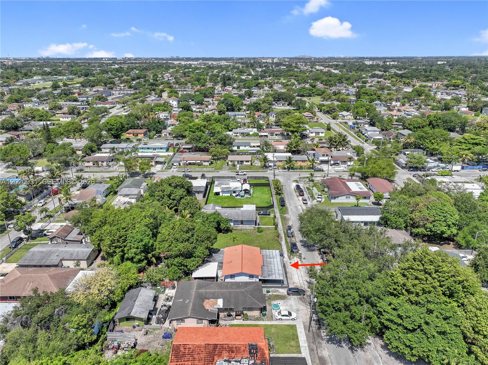 1360 Northwest 77th Street Miami, FL 33147 - Photo 40 of 41 an aerial view of residential houses with city view