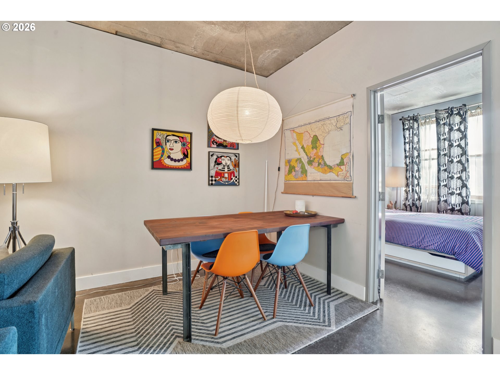 411 Northwest Flanders Street, Unit 302 Portland, OR 97209 - Photo 11 of 41 a view of a dining room with furniture and a large window