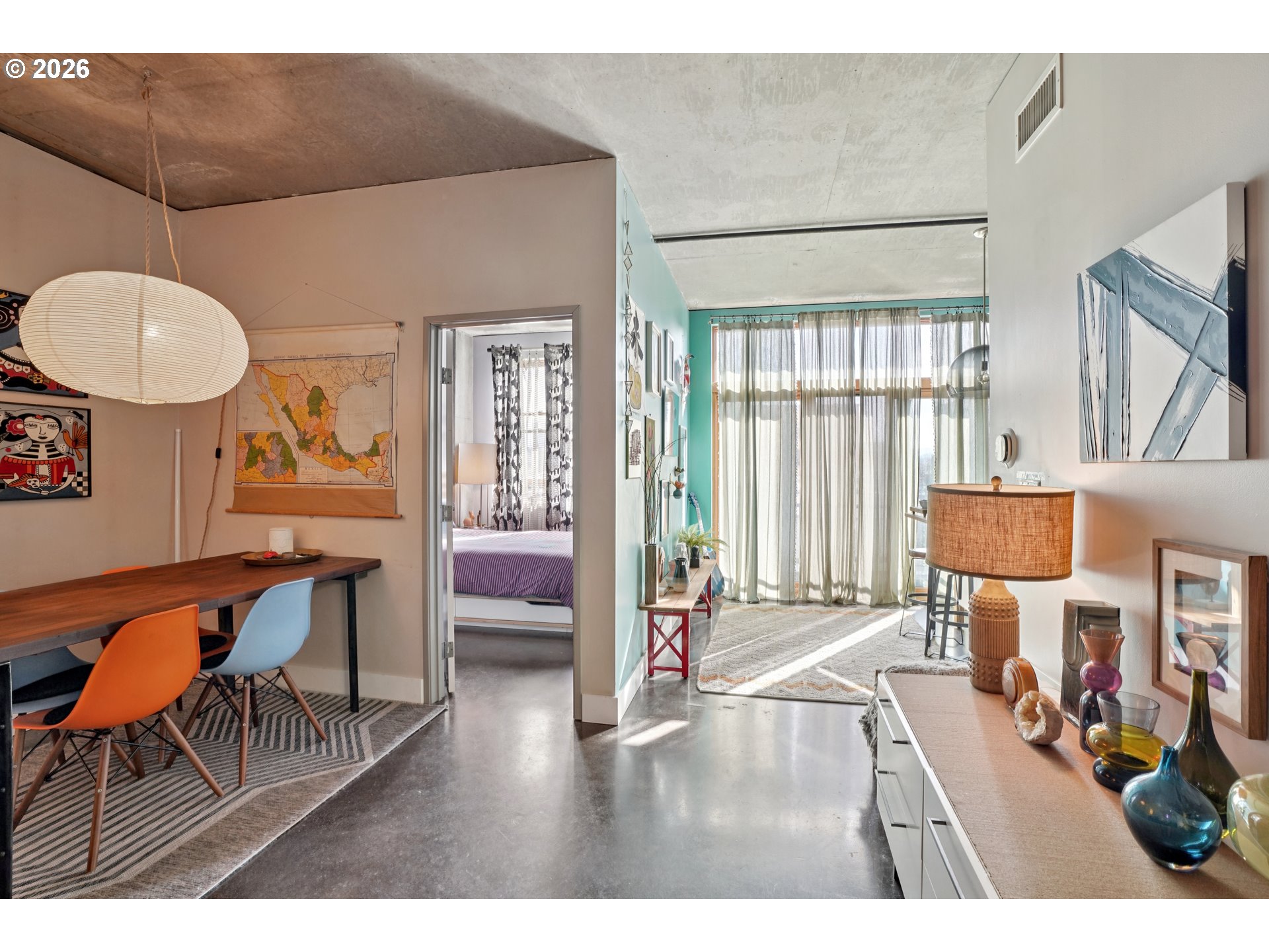 411 Northwest Flanders Street, Unit 302 Portland, OR 97209 - Photo 12 of 41 a living room with furniture and a wooden floor