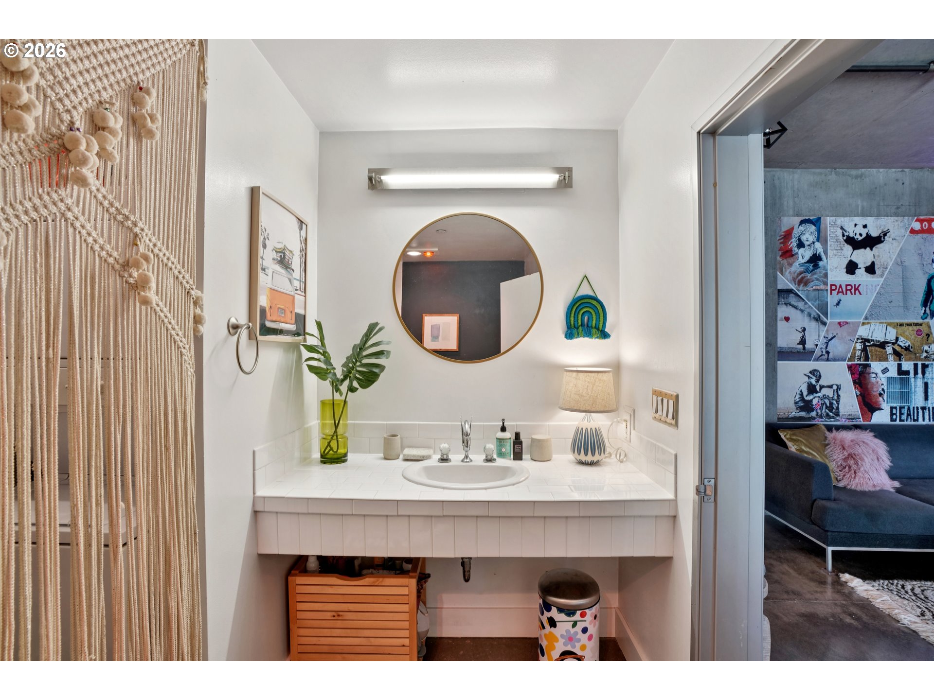 411 Northwest Flanders Street, Unit 302 Portland, OR 97209 - Photo 24 of 41 a bathroom with a sink and a mirror